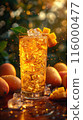 Iced tea with Mango, surrounded by mangoes and ice cubes 116000477