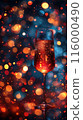 A glass of wine is sitting amidst glowing Christmas lights 116000490