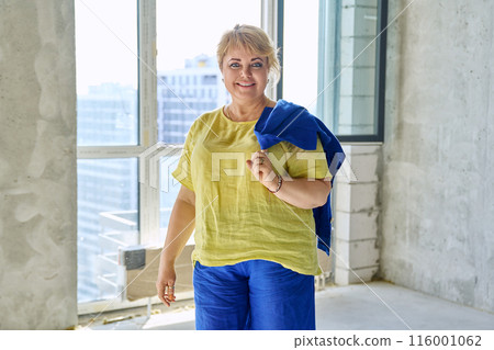 Portrait of beautiful successful 50 years old woman looking at camera Portrait of beautiful successful 50 years old woman looking at camera 116001062
