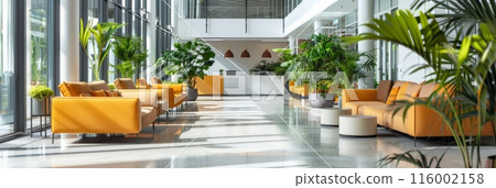 Modern office space with stylish chairs and lush green plants. Vibrant and comfortable environment for coworking and casual meetings. 116002158