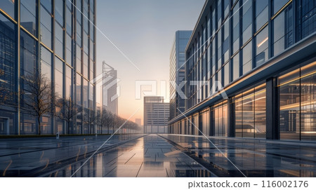 Modern business district with sleek glass buildings and a tranquil early morning atmosphere. Ideal for corporate presentations and urban themes. 116002176