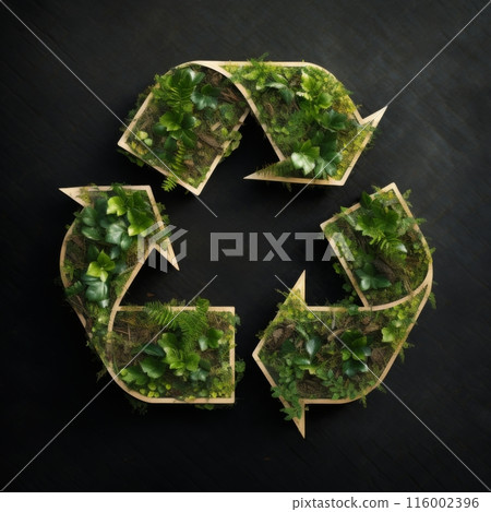 A collection of plastic bottles arranged to form the universal recycling symbol.  116002396