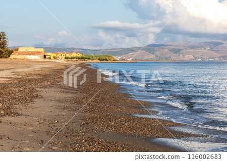 Sea shore. Beautiful empty beach in summer sunny day on Crete island in Greece. Sea shore. Beautiful empty beach in summer sunny day on Crete island in Greece. 116002683