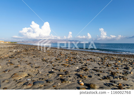 Sea shore. Beautiful empty beach in summer sunny day on Crete island in Greece. Sea shore. Beautiful empty beach in summer sunny day on Crete island in Greece. 116002768