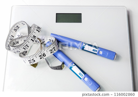 Ozempic Insulin injection pen for diabetics. Concept of losing weight with the drug. Ozempic Insulin injection pen for diabetics. Concept of losing weight with the drug. 116002860