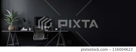 Modern dark office setup with desktop computer and green plant. Sleek and professional workspace. 116004622