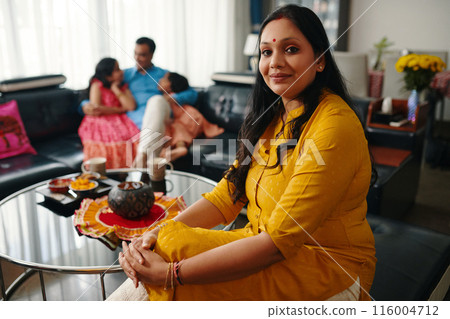 Woman Spending Time With Her Family Woman Spending Time With Her Family 116004712