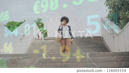 Image of stock market data processing over african american businesswoman climbing down stairs 116005559