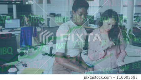 A group of diverse businesswomen working together on a laptop in an office 116005585