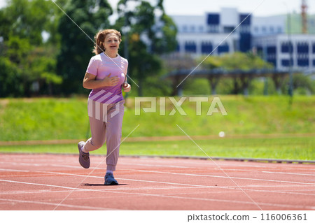 Elderly woman exercising. Fit senior lady running. Elderly woman exercising. Fit senior lady running. 116006361
