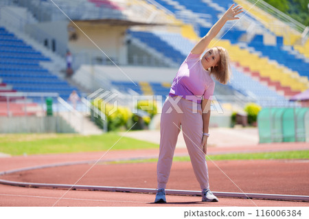 Elderly woman exercising. Fit senior lady running. Elderly woman exercising. Fit senior lady running. 116006384