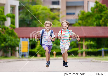 Child happy to be back to school. 116006473