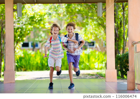 Child happy to be back to school. 116006474