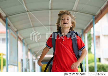 Child happy to be back to school. Child happy to be back to school. 116006477