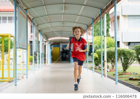Child happy to be back to school. Child happy to be back to school. 116006478
