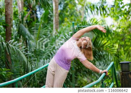 Elderly woman exercising. Fit senior lady running. Elderly woman exercising. Fit senior lady running. 116006642