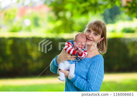 Mother and baby in a park 116006661