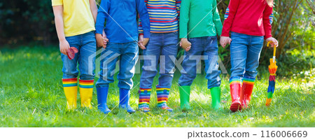 Kids in rain boots. Rubber boots for children. 116006669