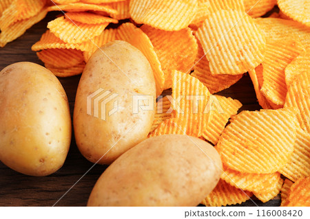Potato chips , delicious BBQ seasoning spicy for crips, thin slice deep fried snack fast food. Potato chips , delicious BBQ seasoning spicy for crips, thin slice deep fried snack fast food. 116008420