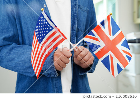 Learning English, Asian teenage student holding flag for language program education. 116008610