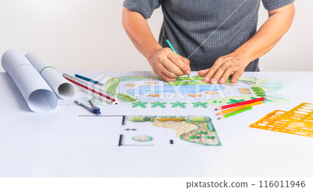 Landscape architect student learning garden plan design by hand drawing. 116011946