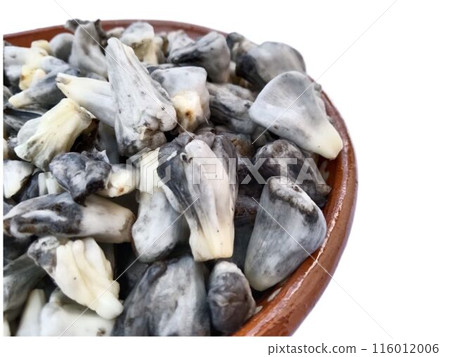 Huitlacoche (black mold corn) served in a Tonala pot Huitlacoche (black mold corn) served in a Tonala pot 116012006