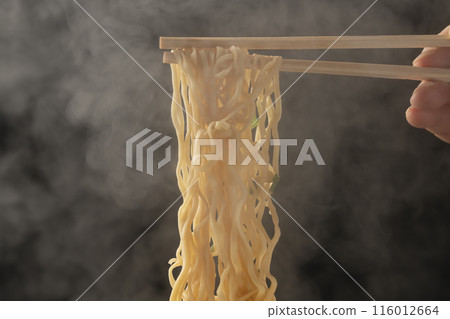 Cup noodles, instant ramen, pick up noodles with chopsticks Cup noodles, instant ramen, pick up noodles with chopsticks 116012664