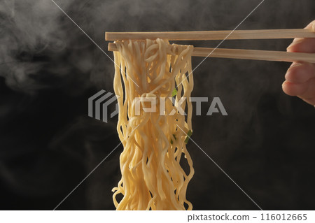 Cup noodles, instant ramen, pick up noodles with chopsticks Cup noodles, instant ramen, pick up noodles with chopsticks 116012665