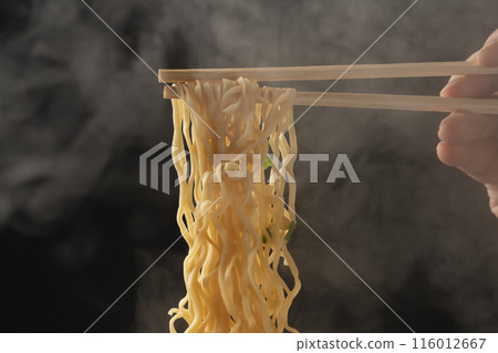 Cup noodles, instant ramen, pick up noodles with chopsticks Cup noodles, instant ramen, pick up noodles with chopsticks 116012667