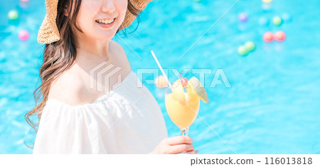 Young Asian woman drinking tropical juice by the pool (resort vacation) Young Asian woman drinking tropical juice by the pool (resort vacation) 116013818