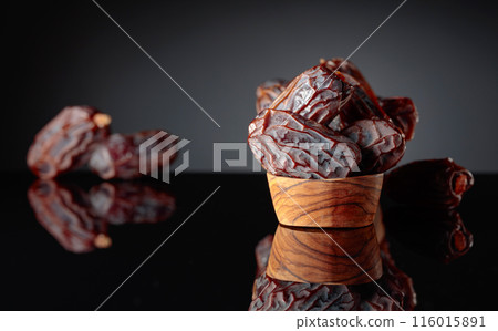 Dates on a black background. 116015891