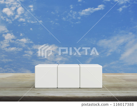 Three white block cubes on wooden table Three white block cubes on wooden table 116017388