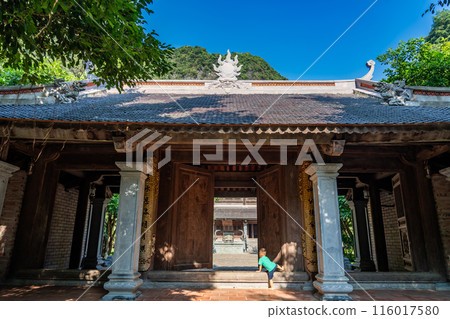 Vietnam Hanoi: A temple to visit on a boat tour of Ninh Binh, a valley river on a rowboat Vietnam Hanoi: A temple to visit on a boat tour of Ninh Binh, a valley river on a rowboat 116017580