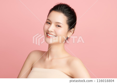 Beautiful young asian woman with clean fresh skin on pink background, Face care, Facial treatment, Cosmetology, beauty and spa, Asian women portrait. 116018804