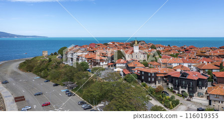Big parking, houses and old church Big parking, houses and old church 116019355