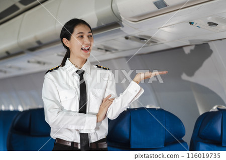 Successful trained airplane captain pilot preparing for flight at Airport. 116019735