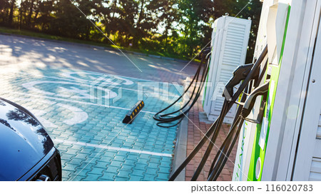EV charging an electric car. Power supply for electric car charging. 116020783