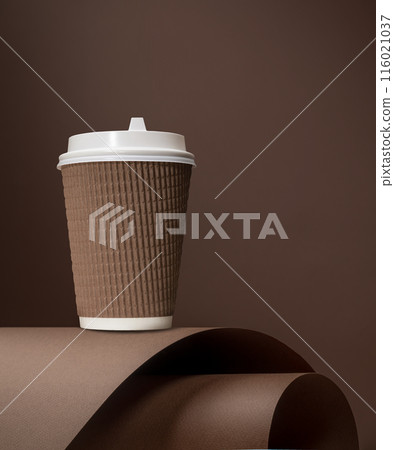 Aesthetic image of a hot paper cup on a brown backdrop Aesthetic image of a hot paper cup on a brown backdrop 116021037