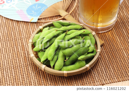 Fresh edamame beans in a colander 116021202