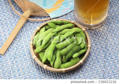 Fresh edamame beans in a colander 116021216