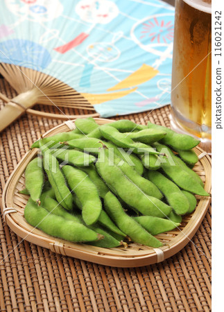 Fresh edamame beans in a colander 116021242