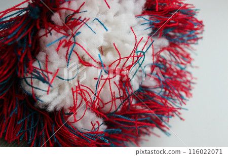 Abstract Pattern Of Colored Yarn Threads Around Stuffing Wool Bunch Isolated On White Abstract Pattern Of Colored Yarn Threads Around Stuffing Wool Bunch Isolated On White 116022071