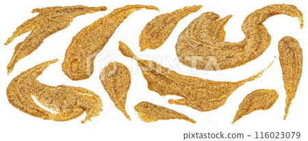 Sweet mustard splashes and stains isolated on white background with clipping path, top view Sweet mustard splashes and stains isolated on white background with clipping path, top view 116023079