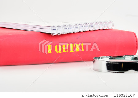 I Quit word on the cover of the book on a white background 116025107