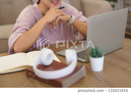 Female entrepreneur working to reading data on laptop and thoughtful about new startup project Female entrepreneur working to reading data on laptop and thoughtful about new startup project 116025958