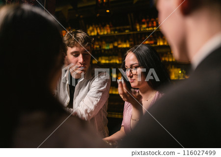 Night life of young people after work in restaurant 116027499