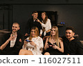 Joyful people enjoy pastime in modern gaming club together 116027511