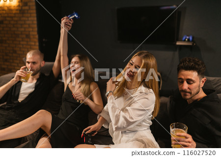 Winning team noisily celebrates victory in video game 116027520