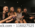 Blonde women root for boyfriends in video game battle 116027525