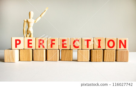 Perfection symbol. Concept word Perfection on beautiful wooden blocks. Beautiful white background. Businessman model. Business perfection concept. Copy space. Perfection symbol. Concept word Perfection on beautiful wooden blocks. Beautiful white background. Businessman model. Business perfection concept. Copy space. 116027742